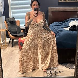 Brown and cream wide leg jumpsuit with pockets and open tie back